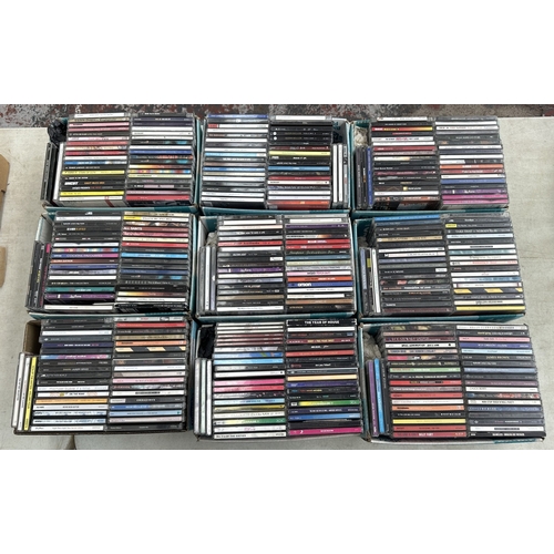 375 - Nine boxes containing CDs to include Kaiser Chiefs, Stereophonics, Hard-Fi, Keane, Madonna, Snow Pat... 