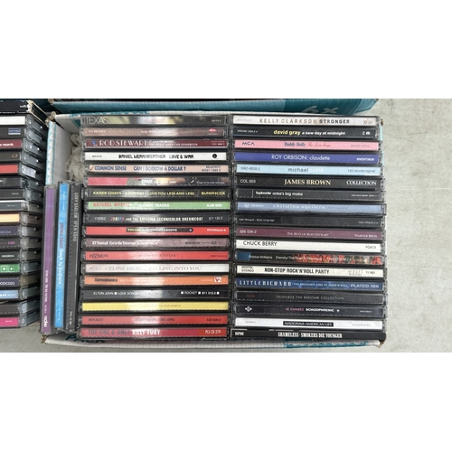 375 - Nine boxes containing CDs to include Kaiser Chiefs, Stereophonics, Hard-Fi, Keane, Madonna, Snow Pat... 