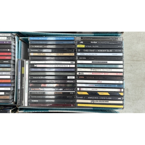 375 - Nine boxes containing CDs to include Kaiser Chiefs, Stereophonics, Hard-Fi, Keane, Madonna, Snow Pat... 