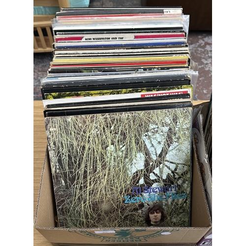 377 - Two boxes containing LP and 12