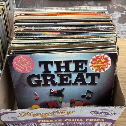 377 - Two boxes containing LP and 12