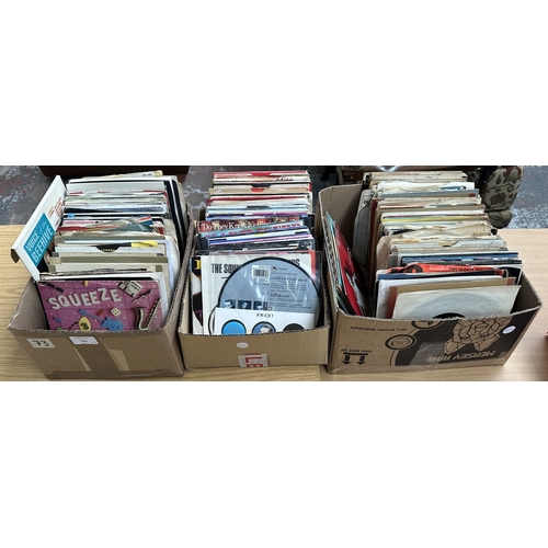 379 - Three boxes containing a collection of 7