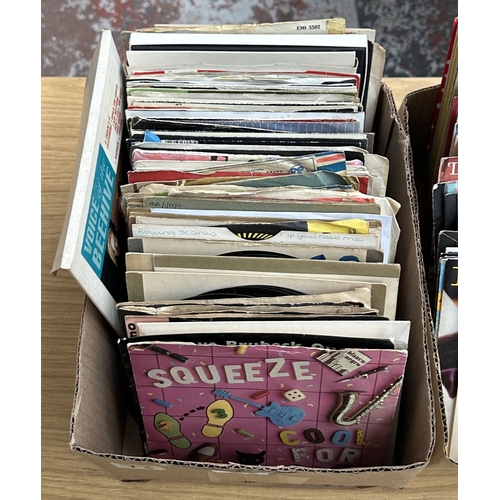 379 - Three boxes containing a collection of 7