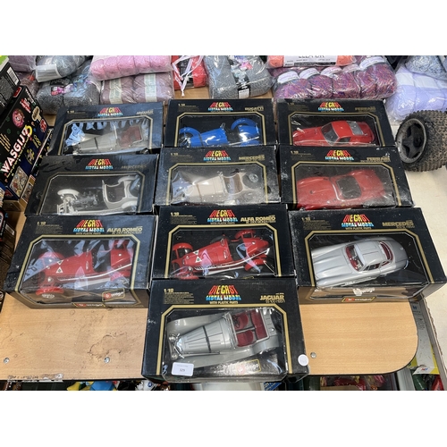 329 - Ten boxed Bburago diecast model vehicles to include 1/18 Bugatti Type 59 (1934), 1/18 Mercedes Benz ... 