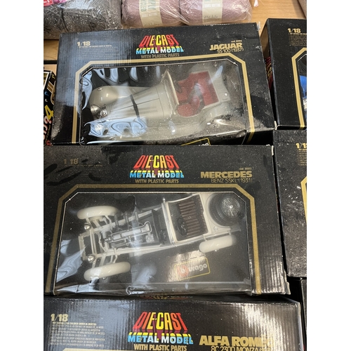 329 - Ten boxed Bburago diecast model vehicles to include 1/18 Bugatti Type 59 (1934), 1/18 Mercedes Benz ... 