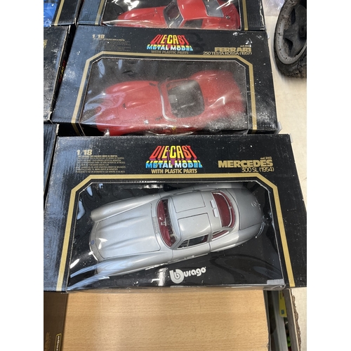 329 - Ten boxed Bburago diecast model vehicles to include 1/18 Bugatti Type 59 (1934), 1/18 Mercedes Benz ... 