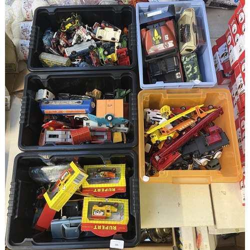 335 - A collection of boxed and unboxed diecast model vehicles to include The Rupert Collection 1928 chevr... 