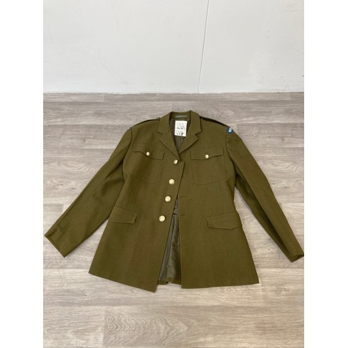 342 - A mid/late 20th century British Army No.2 Scots Guards dress uniform comprising jacket and trousers ... 