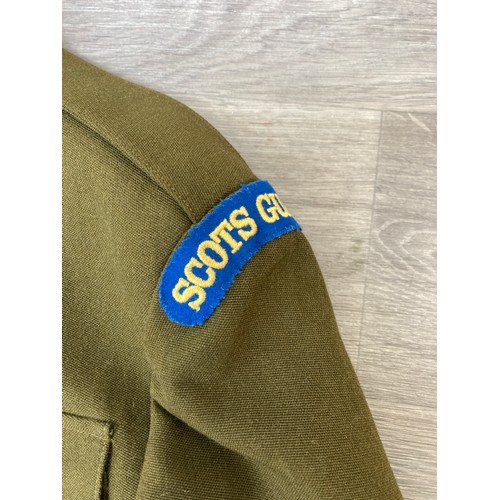 342 - A mid/late 20th century British Army No.2 Scots Guards dress uniform comprising jacket and trousers ... 