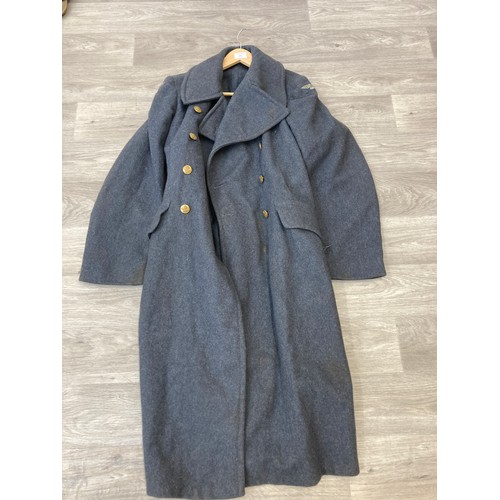 343 - Seven items to include cased WWII entrenching tool, WWII canvas gas mask bag containing pewter hip f... 