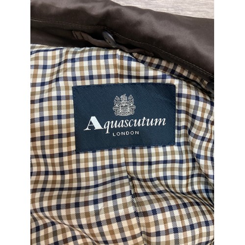 341 - An Aquascutum London brown polyester trench coat