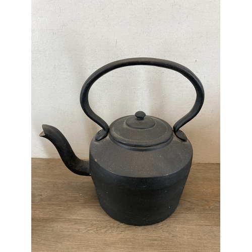 342 - Five items of late 19th century and later metalware, copper coal scuttle, copper kettle, cast iron k... 