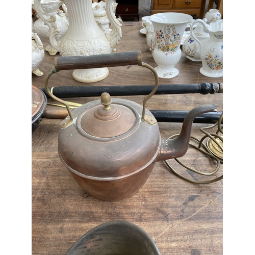 350 - A collection of metalware to include Valor paraffin heater, Best Duty South African cast iron cookin... 