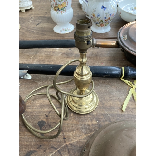 350 - A collection of metalware to include Valor paraffin heater, Best Duty South African cast iron cookin... 