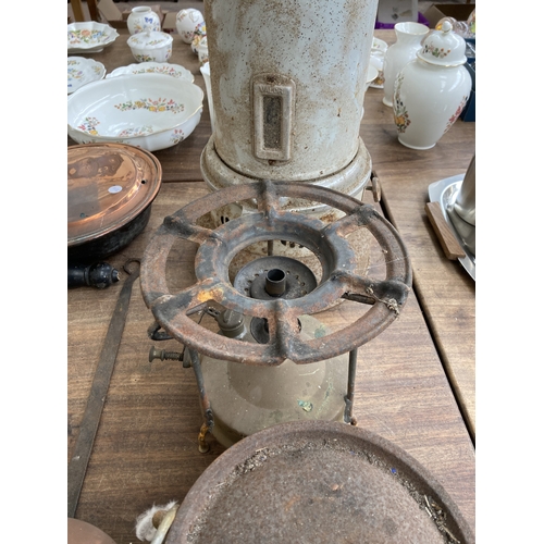 350 - A collection of metalware to include Valor paraffin heater, Best Duty South African cast iron cookin... 