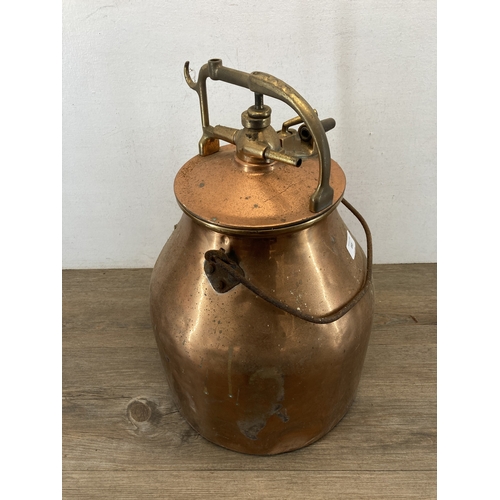 353 - An early/mid 20th century copper and brass milking bucket with spare lid - approx. 47cm high