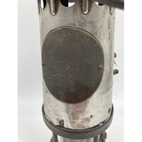356 - A mid 20th century Protector Lamp & Lighting Co. Ltd. Type 6RS brass and steel miner's safety lamp, ... 