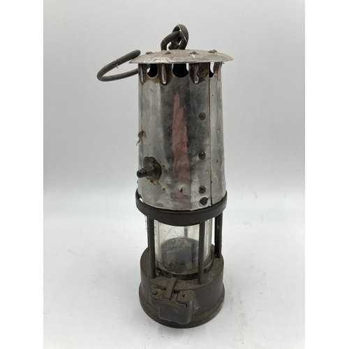 356 - A mid 20th century Protector Lamp & Lighting Co. Ltd. Type 6RS brass and steel miner's safety lamp, ... 