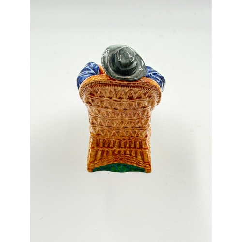 271 - A Royal Doulton Taking Things Easy figurine - HN2677