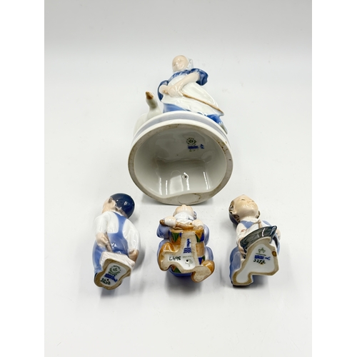 274 - Four Royal Copenhagen porcelain figurines, Goose Girl #527 by Christian Thomsen, Boy With Boat #3272... 