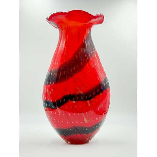 276 - A pair of Murano style red and blue art glass vases with bubbled decoration - approx. 36cm high