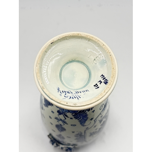 277 - A Franz Anton Mehlem (Royal Bonn 1890-1920) Delft hand painted blue and white porcelain twin handled... 