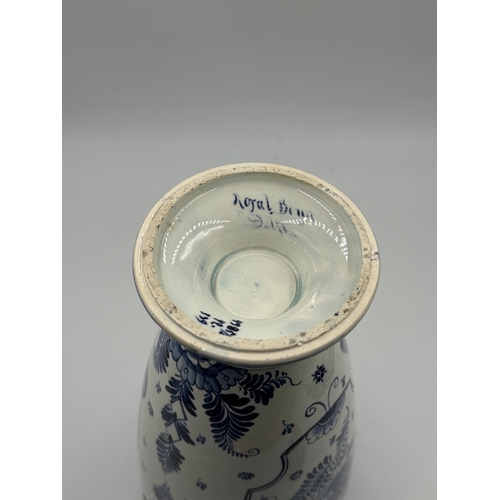 278 - A Franz Anton Mehlem (Royal Bonn 1890-1920) Delft hand painted blue and white porcelain twin handled... 