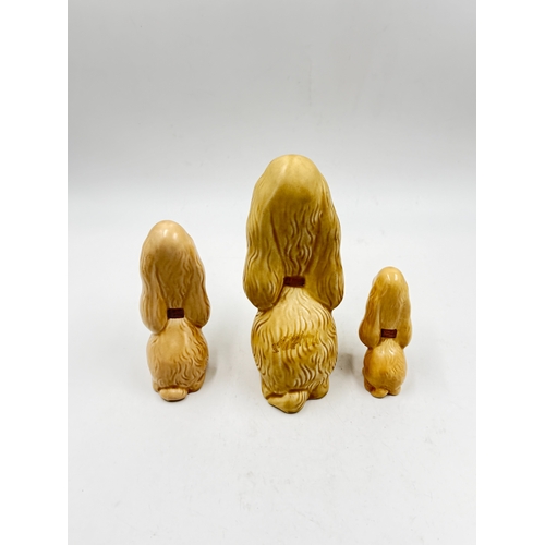 286 - Three mid 20th century Sylvac Sad Sam dog figurines - largest approx. 18cm high