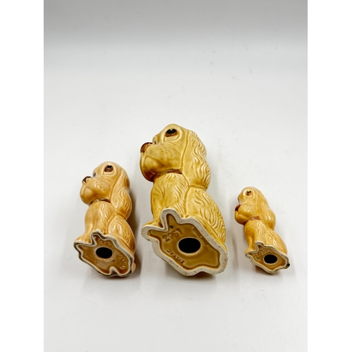 286 - Three mid 20th century Sylvac Sad Sam dog figurines - largest approx. 18cm high