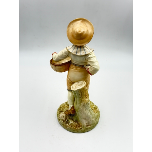 288 - A Royal Worcester hand painted porcelain figurine of a boy with basket by James Hadley, numbered 138... 