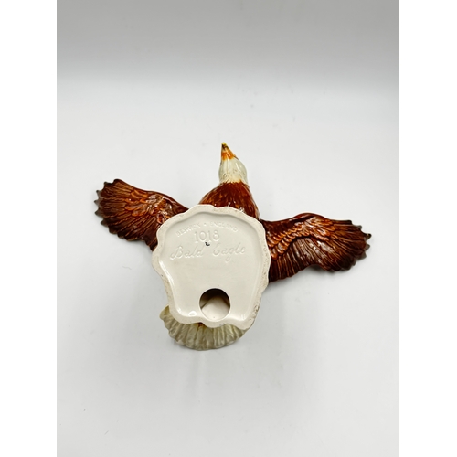 294 - A Beswick No. 1018 Bald Eagle figurine - approx. 19.5cm high x 33cm wide