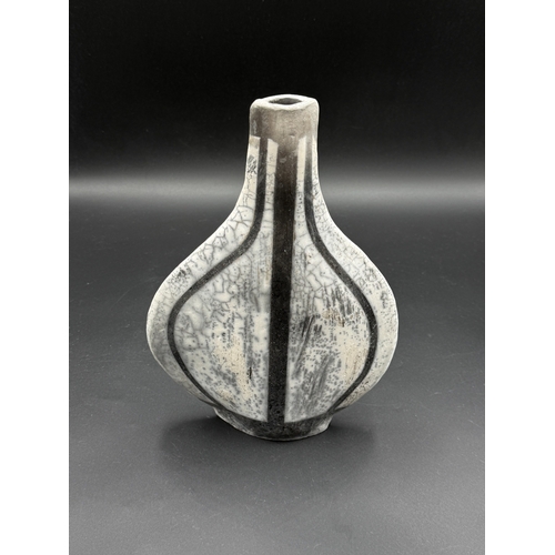295 - A Raku studio pottery bottle form vase, inscribed MC to base - approx. 24cm high