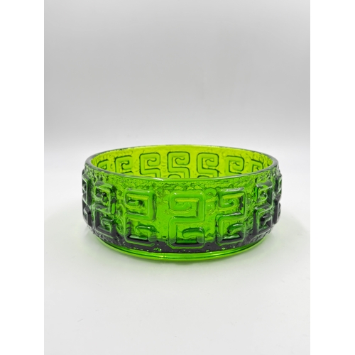 297 - Two pieces of mid 20th century glassware, one Dartington kingfisher blue textured bark vase by Frank... 