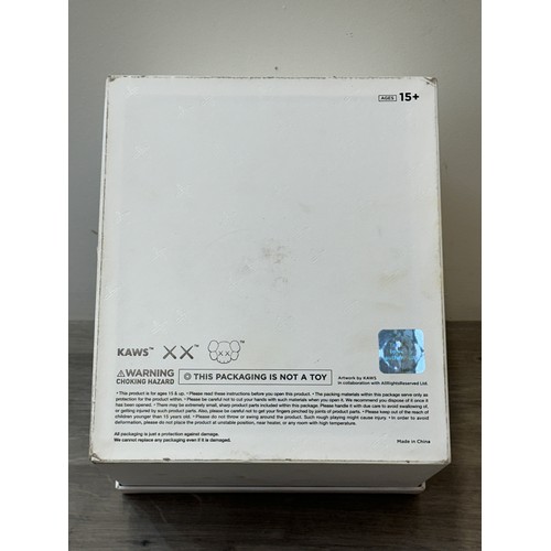 187 - A boxed KAWS: Holiday Changbai Mountain limited edition vinyl figure - approx. 21cm high