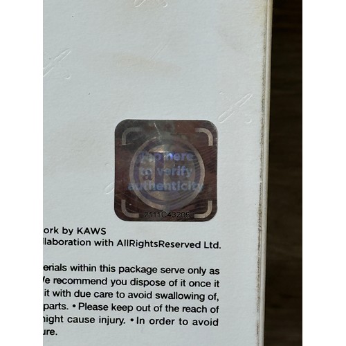 187 - A boxed KAWS: Holiday Changbai Mountain limited edition vinyl figure - approx. 21cm high