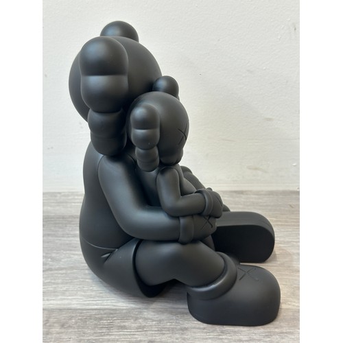 187 - A boxed KAWS: Holiday Changbai Mountain limited edition vinyl figure - approx. 21cm high
