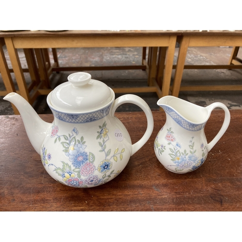 324 - Forty pieces of Royal Doulton Coniston fine bone china to include eleven teacups, saucers and side p... 