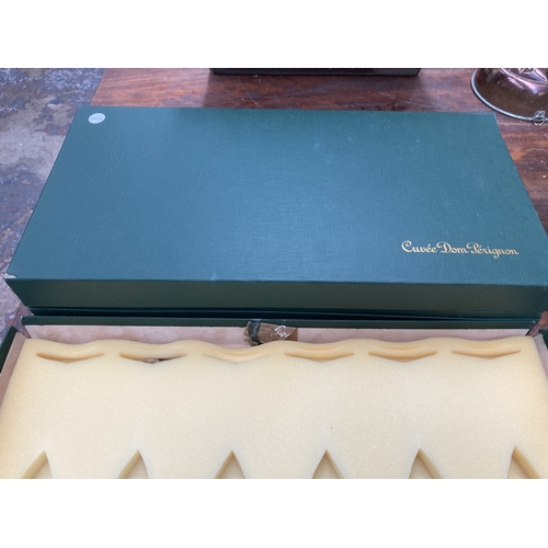 330 - Two boxed sets of Cuvée Dom Pérignon hollow stem champagne flutes