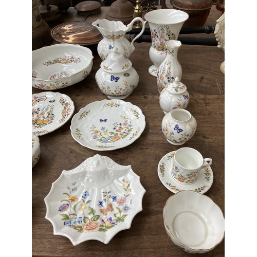 335 - Thirty eight pieces of Aynsley ceramics to include Somerset, Cottage Garden etc.