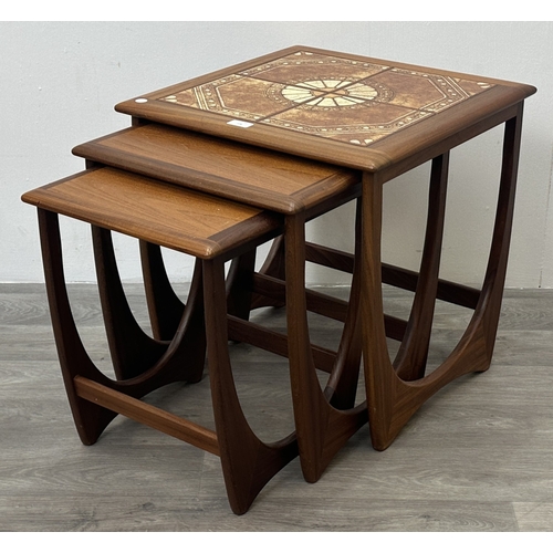 124 - A mid 20th century G Plan Astro teak and tiled top nest of tables - approx. 51cm high x 50cm wide x ... 