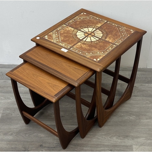124 - A mid 20th century G Plan Astro teak and tiled top nest of tables - approx. 51cm high x 50cm wide x ... 