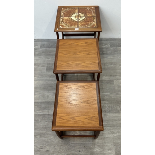 124 - A mid 20th century G Plan Astro teak and tiled top nest of tables - approx. 51cm high x 50cm wide x ... 
