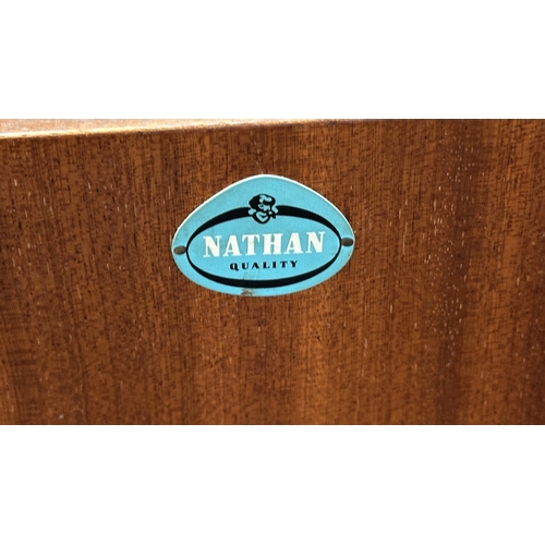 129 - A mid 20th century Nathan teak and ebonised bookcase with four glass sliding doors - approx. 98cm hi... 