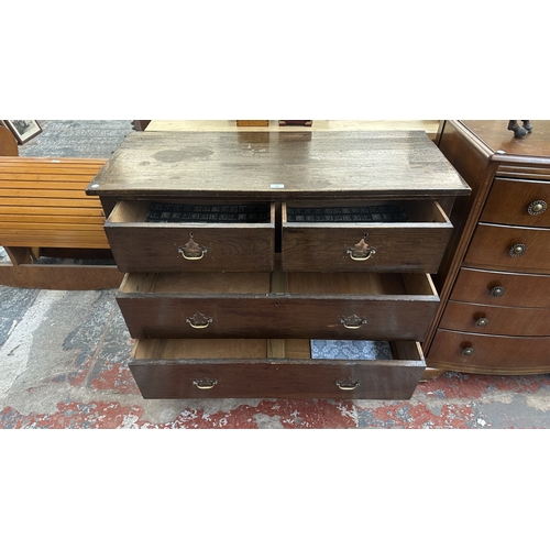 141 - A late 19th/early 20th century oak chest of drawers - approx. 95cm high x 106cm wide x 45cm deep