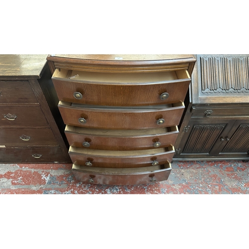 143 - A mid 20th century Lebus Furniture oak chest of drawers - approx. 102cm high x 77cm wide x 45cm deep