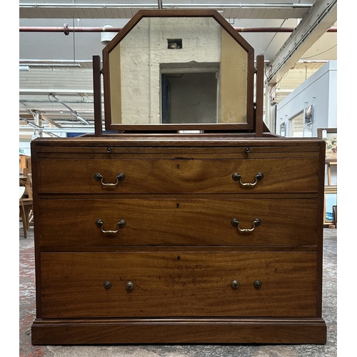 145 - A late 19th/early 20th century mahogany dressing chest with upper mirror and brushing slide - approx... 