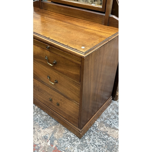 145 - A late 19th/early 20th century mahogany dressing chest with upper mirror and brushing slide - approx... 