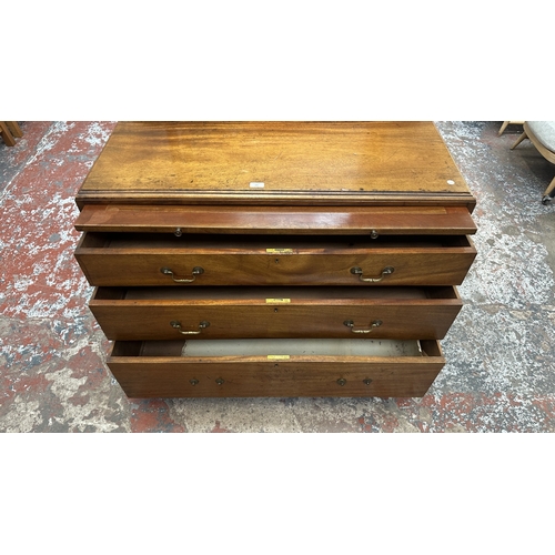 145 - A late 19th/early 20th century mahogany dressing chest with upper mirror and brushing slide - approx... 