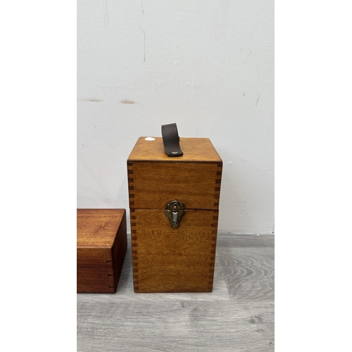 148 - Four items, one Chinese red lacquered wooden jewellery cabinet with brass decoration and carved cork... 