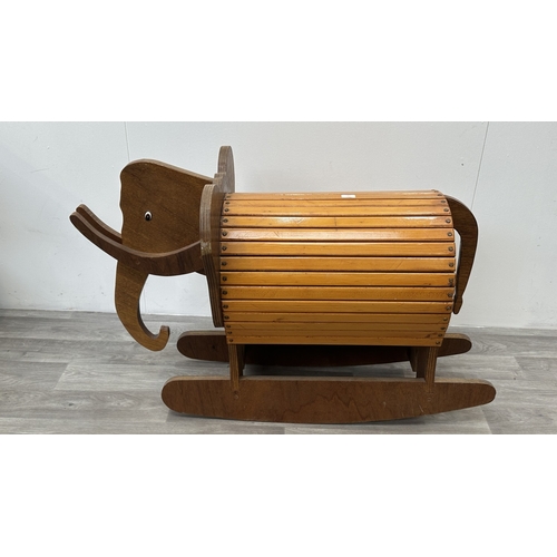 150 - A mid 20th century wooden rocking elephant - approx. 79cm high x 60cm wide x 120cm deep